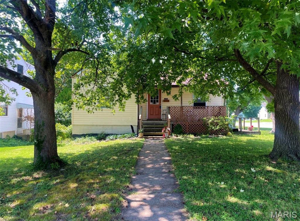 Are you looking to add a rental property?  This nice bungalow style home within about a 10 minute walk from the MS&T library could be a great addition to your investment property portfolio!  Home is already leased for $1200 per month till 2027.  The tenants are taking great care of this home.  3 bedrooms on the main level, real wood floors, then a full basement that has 2 other rooms that could be used as bedrooms, large laundry area, storage area and walkout to the back yard.  There is off street parking via the alley way behind the house.  Covered front porch, big side deck.