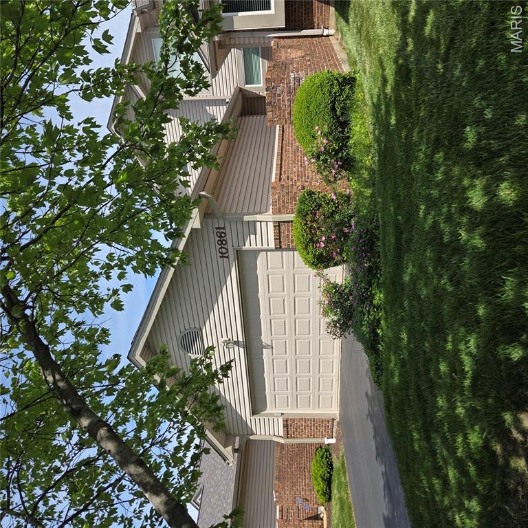 Rarely does a home in Briarcliff come to market fully updated and move-in ready. A 3+ bedroom, 3 1/2 bath home in the Ladue School District that has been renovated from top to bottom with no detail overlooked. The showstopper kitchen has custom maple cabinetry, granite countertops, newer stainless steel appliances, including an Induction Cooktop and Asko Dishwasher.  Whether you are hosting a dinner party or enjoying a quiet morning, this kitchen delivers the space and style to match. The Vaulted Great Room centers around a the Wood Burning Fireplace featuring  recessed lighting, creating a warm and inviting space to relax and entertain.  The Soaring ceilings,  AND direct access to the private deck overlooking serene lake views. Whether morning coffee or evening entertaining, the outdoor spaces are a true highlight of this home. Real Wood Floors greet you at the front door and continue throughout the entire First Floor.  The enormous Main Floor Primary Suite provides a Walk In Closet with Organizers as well as Second Closet with Shelving for Shoes and Accessories.  THe Luxury Bath ensuite bath features a Walk In Shower and tile floors and double sink vanity. The highly valued Main Floor Laundry allows one floor Living! Upstairs, the home offers a generously sized bedroom and a LOFT (could be Bedroom, currently utiized as an Office/Den) along with a beautifully updated Full bath with Walk In Shower. The finished Walkout lower level adds tremendous flexibility with a large family room with Entertaining Kitchen offering Microwave Dishwasher, Refrigerator and Island with Seating.  There is walk-out access to a covered  porch with sweeping lake views, a full bath, and an additional bedroom ideal for guests, in-laws, or a home office. Additional highlights include a 2-car garage, deck and porch with gorgeous views of privacy, located at the end of the community, and association management for low-maintenance living. All of this just minutes from Olive Boulevard shopping and dining, with easy access.
