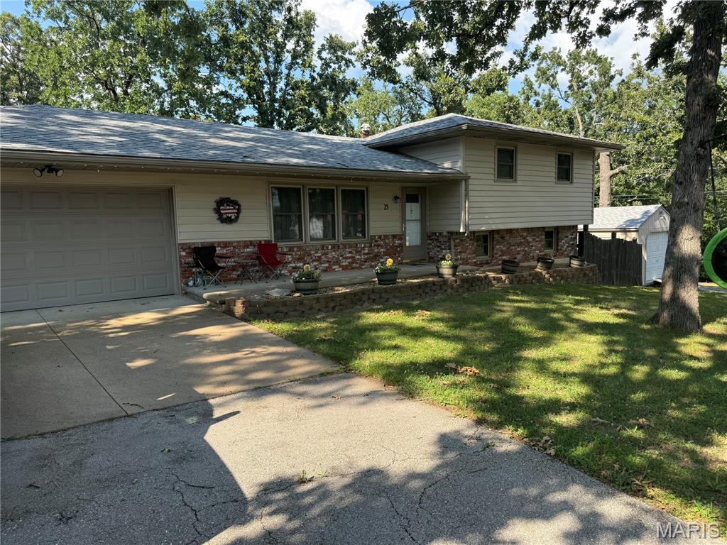 This four bedroom three bathroom home is located in a quiet area that just happens to be on a wooded lot. This property offers a nice sized living room, beautiful kitchen, and dining room on the main level. Upstairs has a full bathroom, master bedroom with a half bath, and two additional bedrooms. Downstairs has the ability to be the master suite with the bathroom having a jacuzzi style jetted tub. The laundry room is also downstairs in the utility room along with the hot water heater. Step out back and relax on the composite deck and enjoy a summer evening BBQ. The shed has solar lighting, this house also is equipped with a home generator!