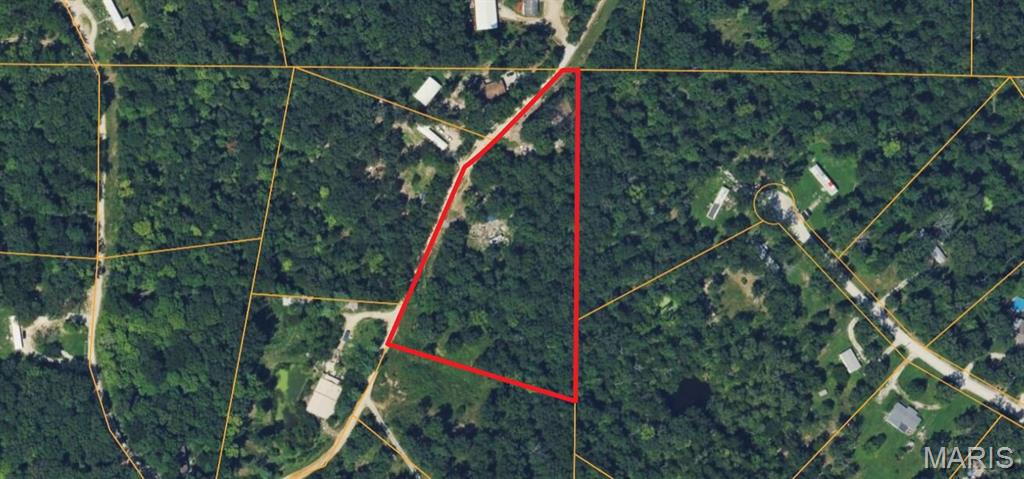 Escape the noise, slow down, and breathe in the fresh air. Tucked away from the hustle and bustle, this 2.79-acre parcel offers the ultimate canvas for your dream lifestyle.

The potential here is undeniable — with a little sweat equity, you can carve our your own private sanctuary. Best of all, a head start is already waiting for you—the property features an existing septic system (with a current inspection included).

Once the initial work is done, you will have a pristine, blank canvas to create whatever your imagination can dream up. Whether you want to build a custom-designed estate home, establish a peaceful weekend cabin, or simply secure a quiet piece of land to reconnect with nature, this property delivers the perfect blend of privacy and possibility.

And, if you want to meet and mingle, there are several local attractions including, Cedar Lakes Cellars Winery, Big Joe's Safari, Katy Trail, Diekroeger Park, Wright City Coffee House and more!
