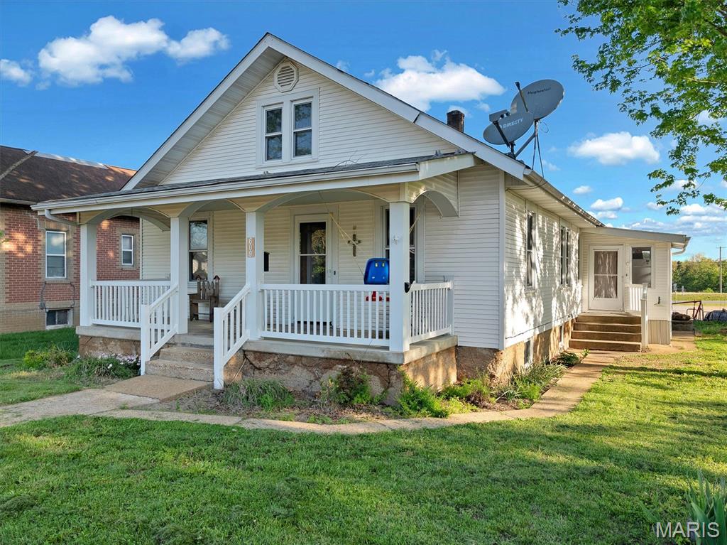 Newly remodeled 3-bedroom home situated on two spacious city lots, offering the perfect blend of character and modern updates. Step inside to find original millwork, beadboard ceilings, and beautiful hardwood floors that showcase timeless charm throughout. The inviting covered front porch creates a warm welcome and is the ideal spot to relax and unwind after a long day. Generous living spaces provide flexibility for everyday living or entertaining guests with ease. The detached 3-car garage offers endless possibilities for storage, hobbies, or the ultimate man cave setup. With room to spread out both inside and out, this property delivers space, charm, and function. A sun room adds even more versatility, perfect for a home office, reading nook, or bonus living area. Conveniently located near local amenities, this is a must-see opportunity you don’t want to miss.