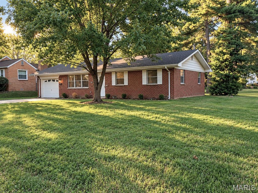 Come Home To Your Beautifully Updated Ranch on 3 Spacious Lots. Step inside and feel right at home in this beautifully renovated 3 bedroom, 1 bath, full brick one story ranch nestled in 3 lots and ready for quick occupancy.  A desirably designed layout with plenty of windows fills the home with natural light creating a warm and inviting atmosphere from the moment you enter. The heart of the home is the welcoming expansive living room perfect for relaxing or special family gatherings. Remodeled open kitchen and dining area showcases new cabinetry, countertops, and stainless steel appliances to include a gas range and microwave is ideal for everyday meals and morning coffee. Freshly painted throughout and thoughtful updates along with new flooring and a new roof makes the home move in ready.  Large park-like backyard with mature trees and abundant open space is perfect for outdoor enjoyment and unwinding. Home offers convenient access to Scott Air Force Base, I-64, St. Louis, shopping, dining, parks, and local wineries. Don’t miss the opportunity to make this stunning gem your home.  Call and schedule your private tour today!