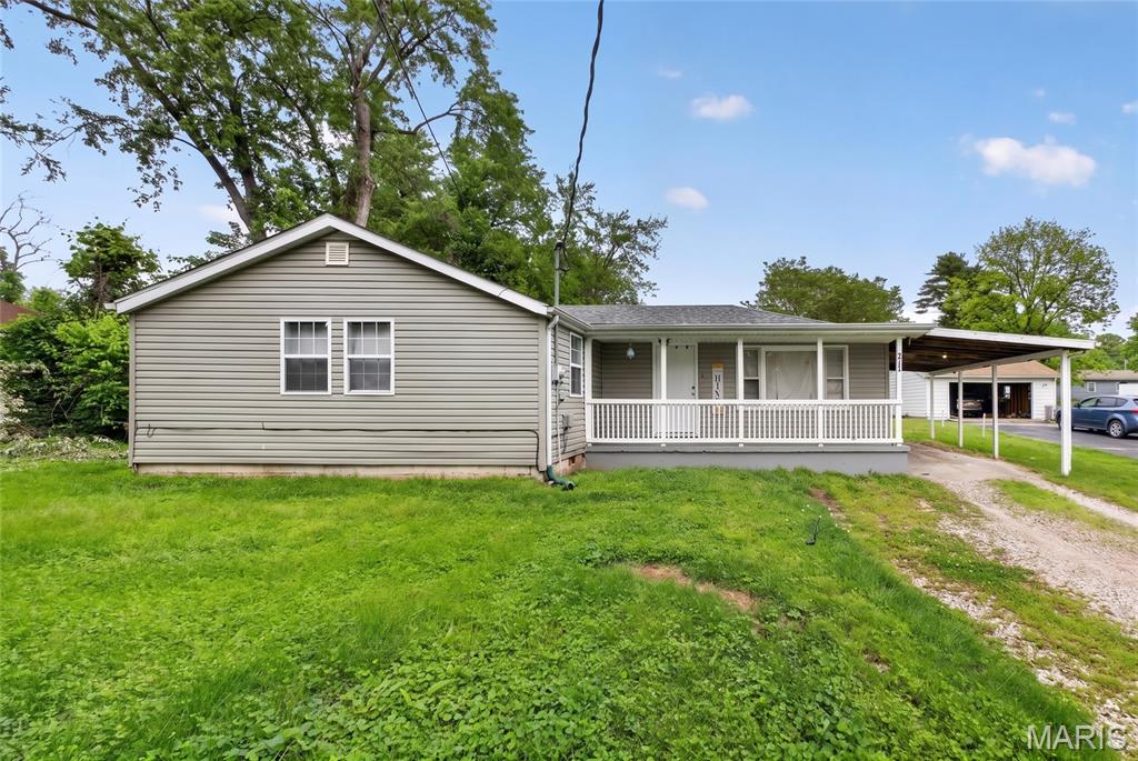 Welcome to this charming 3-bedroom, 1-bath single-family home located at 517 Belvedere Dr in Belleville. Built in 1950, this property offers 1,176 square feet of comfortable living space featuring a classic open frame porch and a convenient covered carport. Situated on a nicely sized 0.26-acre lot (11,326 sq. ft.) with an expansive backyard, this home presents a fantastic opportunity for buyers looking to put down roots in the Stookey township and Harmony Emge school district.
