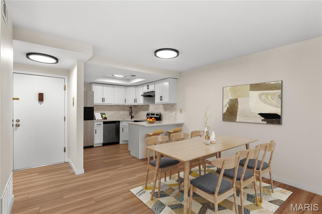 Why rent when you can own? This beautifully remodeled 1-bedroom, 1-bath condo is move-in ready and packed with updates! Step inside to find a brand-new kitchen featuring white shaker cabinets, new appliances and updated lighting. Luxury vinyl plank flooring flows throughout the open layout, leading to a spacious living area with a private balcony—perfect for your morning coffee or evening unwind. The large bedroom offers plenty of comfort, while the updated bathroom, in-unit washer & dryer, and modern fixtures add convenience and style. The building includes an elevator for easy access and your own assigned garage parking spot. Plus, enjoy incredible easy access to Hwy 364 and Hwy 94, making your commute and daily errands a breeze. With every detail updated (including electric panel), this condo is the perfect opportunity to start building equity instead of paying rent. 
*Owner is licensed real estate agent in state of Missouri