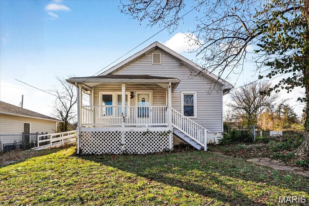 This 4-bedroom ranch offers a solid foundation of updates and is ready for your finishing touches. Enjoy peace of mind with improvements including newer doors and windows, ceramic tile flooring that highlights the spacious eat-in kitchen, updated panel, and portions of PVC plumbing. An inviting covered front porch welcomes you home, while an additional covered porch in the backyard provides a great space for outdoor entertaining. The vacant lot next door offers exceptional privacy, and off-street driveway parking adds convenience. A full basement provides ample room for storage or future expansion. Located within walking distance to shops, restaurants, Walmart, and just minutes from easily accessible highways. Best of all—this property is in the highly sought-after Kirkwood School District. Property to be sold in As-Is condition.