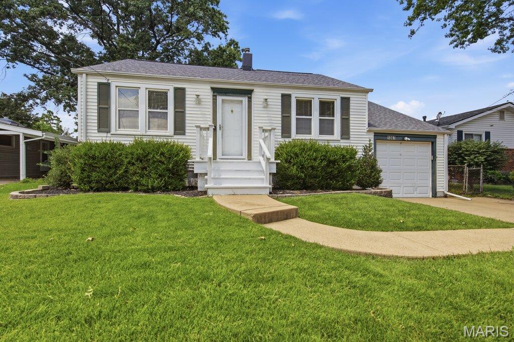 Hello Crestwood, there's a new listing in town! This Two Bedroom Ranch in the Lindbergh School District is exactly what you are searching for! Hardwood floors and plenty of natural light greet you as you enter the front door. A spacious family room and separate dining room compliment the front of the house. As you move towards the kitchen you are welcomed with vibrant royal blue cabinets, plenty of counter space, under cabinet lighting and an exit to the backyard with a beautiful wooden deck! To your left is the primary bedroom and full main level bathroom- to your right, your second bedroom with vaulted celings! Making your way downstairs you will find the second half bathroom, a recreational area- perfect for a home theater room, play place for children, in home office, gym or anything else you might want and laundry. A walkout basement and a 1 car garage will complete this home tour! Your backyard is level, fenced in and a fire pit is set up for relaxing evenings or with friends. This location is perfect! Easy access to Lindbergh Rd, Highway 44, 270 and Watson Rd. There are multiple neighborhood parks in this subdivision and it is smack dab in the middle of everything Crestwood has to offer! Schedule your showing and come see this beautiful home in person!!