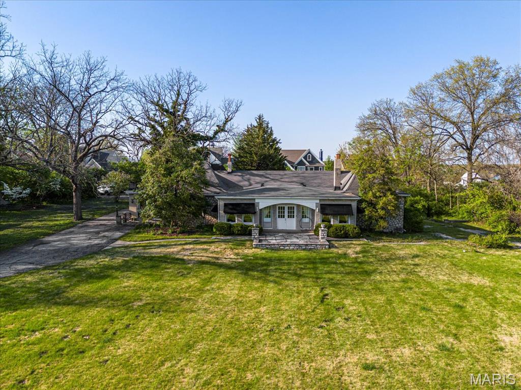 A premier opportunity on a generous 2.16-acre lot in the secluded Clayton Terrace neighborhood. With over 3800 sq ft featuring 4 bedrooms and 3 full baths, this property is ripe for a renovation, fix-and-flip, custom build, or complete tear-down to create your dream home. Located within Ladue School District (Conway Elementary), it also offers excellent convenience to highways, hospitals, and shopping. Sold in AS IS condition and priced to move quickly, showings begin April 21st at 10am.