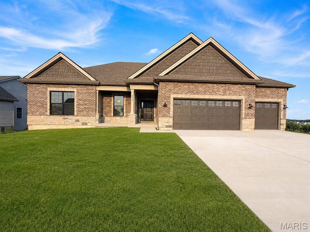 Discover exceptional new construction in Washington, Missouri! This beautifully designed 1,900+ sq. ft. home offers the space, finishes and functionality today’s buyers are searching for. The open-concept floor plan features soaring ceilings, abundant natural light and a spacious kitchen with quartz countertops, a large center island, upgraded cabinetry and plenty of room for entertaining.

The private primary suite includes a generous walk-in closet and a beautifully finished bathroom with a walk-in shower. Main-floor laundry, spacious secondary bedrooms and thoughtfully selected modern finishes make everyday living comfortable and convenient.

Step outside and enjoy a premium homesite that backs to trees, providing a more private backyard and a peaceful natural setting. The covered outdoor living area is perfect for morning coffee, weekend gatherings or relaxing at the end of the day.

A finished lower level adds valuable additional living space for a recreation room, home theater, fitness area, guest accommodations or home office. The oversized three-car garage provides excellent space for vehicles, storage, hobbies and recreational equipment.

Located in desirable Washington, MO, this home offers convenient access to shopping, dining, healthcare, schools, parks, walking trails and the vibrant downtown riverfront. Enjoy small-town charm, a welcoming community and an easy commute to the St. Louis metro area. Don’t miss this opportunity to own a move-in-ready home with more than 1,900 square feet, a finished lower level, three-car garage and a tree-lined backyard.
