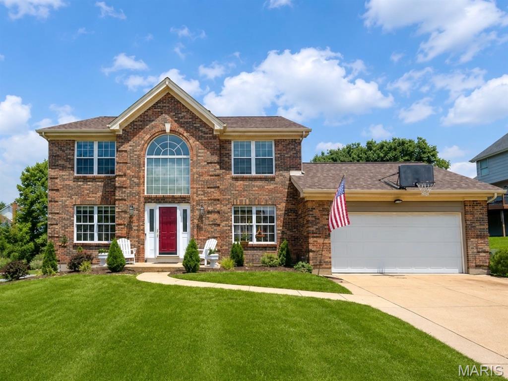 Welcome to 16250 Audubon Village, this beautiful 2 story brick home is located in the highly sought-after Rockwood School District and Villages of Cherry Hills neighborhood. Step inside to the large open foyer that lets in tons of light from the Palladian window and features pristine hardwood floors. There is a gorgeous dining room with coffered ceilings and wainscoting, perfect for hosting family gatherings. The dedicated home office room is fit with wainscoting, French doors and ample light. Make this area into an additional sitting area, play area, or hobby room. The large living room showcases a gas fireplace, beautiful bay windows and is open to the large kitchen making this area truly the heart of the home. This stunning kitchen is a chef’s dream, equipped with all stainless-steel appliances, gas stove, granite countertops, soft close drawers, huge pantry and ample storage space. Just off the kitchen is a large eat in area perfect for early morning breakfast or family dinners. Around the corner there is main floor laundry as well as a large 2 car garage with an oversized driveway. At the top of the stairs is the spacious primary suite featuring separate his and hers closets, French doors and en suite bathroom. Relax and unwind in the spacious and bright bathroom featuring a large soaking tub, separate shower and a double vanity. There are three additional spacious bedrooms and a hall bath on the second floor. Downstairs there is large finished basement perfect for additional gathering or recreational space. There is also a finished bonus room off the stairs with a connected full bathroom. Out back you find a spacious flat backyard backing to woods. The covered patio makes this the perfect place to entertain and enjoy with friends and family. This home also features major updates that include a new roof in 2024, new HVAC 2025, newer electric panel and Rhino Shield Paint. The Cherry Hills neighborhood has so much to offer. There are two pools within walking distance (one just steps away), tennis courts, playgrounds and ponds. In addition to that you will enjoy living close shopping, dining, and Wildwood Town Center. This beautiful home is ready for you to create new family memories. Schedule your private showing today!