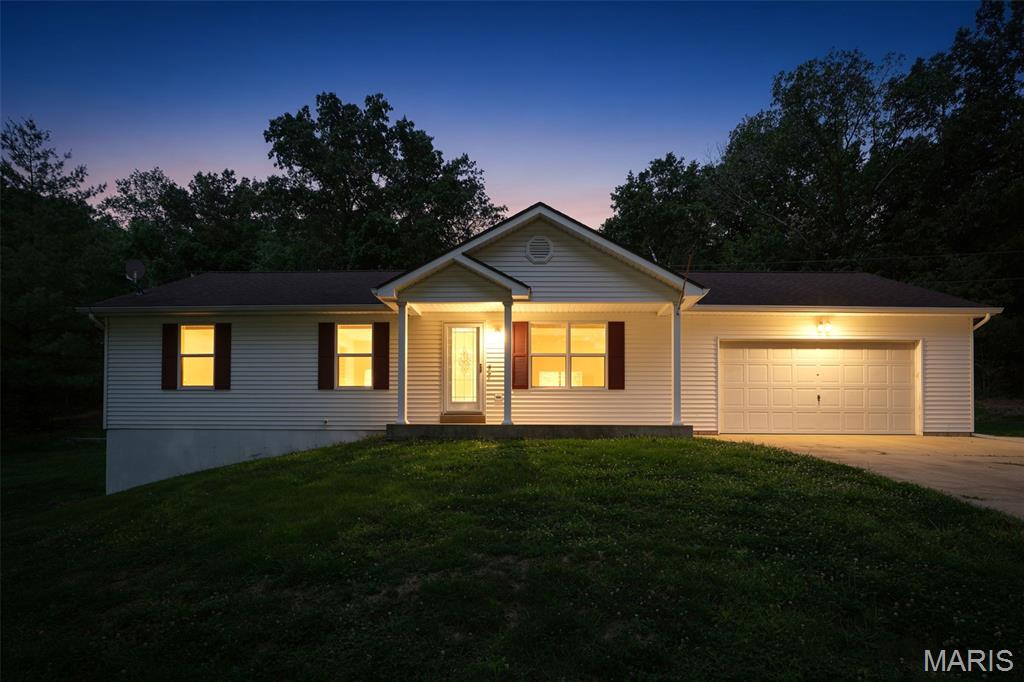 Completely renovated move in ready! Ranch home with oversized 2 car garage 3 bedrooms 3 bathrooms on large private lot. Located at the end of the street at the cul de sac, this home sits back off the street for a private yard. Enjoy the front porch with a beautiful glass entry door. Open floor plan for the living room, kitchen and dining. New kitchen cabinets, counter and appliances! Sliding glass doors lead to the patio and backyard with a wooded view. New floors, fresh paint, and new fixtures throughout! Primary bedroom suite features an updated bath with tile shower and has double closets. 2 bedrooms and full bath complete the main floor. Downstairs is a walk-out to a small patio, a full bath and a plenty of space for family rec room or extra sleeping space with full bathroom! Enjoy the nearly 1 acre park like setting! With above ground swimming pool and extra parking for all of your toys! Close to I-44 and shopping & restaurants in Washington or Union! 1 year Choice Home Warranty Included!  Call today for a personal tour!