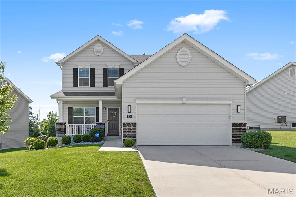 Welcome home to this beautifully designed two-story in the highly desirable Wyndstone neighborhood of Lake St. Louis. Built just 7 years ago, this move-in-ready home offers 3 bedrooms, 2.5 baths, and stylish, modern living space.

The kitchen is a standout feature with upgraded cabinetry, quartz countertops, ceramic tile backsplash, and plenty of space for cooking and entertaining. The functional layout flows seamlessly into the main living area, creating a bright and inviting atmosphere throughout.

Upstairs, you’ll find spacious bedrooms and a comfortable primary suite with a private bath and convenient second floor laundry.  Step outside to enjoy the large fully fenced backyard complete with a sprinkler system — perfect for relaxing, entertaining, or pets and play.

Located in a fantastic neighborhood with easy access to shopping, restaurants, schools, and highways, this newer home combines comfort, style, and convenience in one exceptional package.