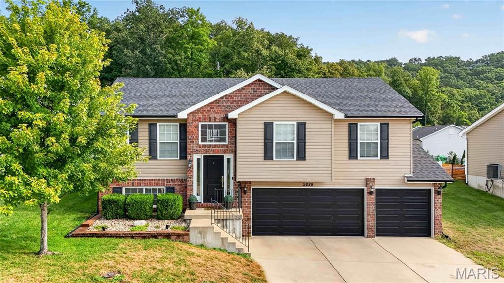 Wow! You'll want to see this beauty; the current owners have made extensive upgrades to this home! Take a look at this stunning split-level home featuring an OVERSIZED three-car garage (27 feet deep), perfect for truck enthusiasts or anyone who needs workshop space. Located on a cul-de-sac, this property is a must-see! 

This young home boasts main-floor laundry and an open floor plan ideal for entertaining or relaxing. It sits on a large, private backyard with a new vinyl fence installed by the seller in 2023. There's also an above-ground pool (installed in 2023) and a pergola (added in 2024) that will remain with the property. This outdoor area is perfect for gathering with friends and family. 
Additionally, a versatile storage shed houses the pool equipment and can double as a serving area for food and drinks—how cool is that? 
The current owners have made extensive upgrades throughout the home, which has a split-bedroom floor plan. The primary bedroom includes a newer vanity, extra cabinetry that will stay, and a walk-in closet. 
They also updated the home with all-new flooring in the main-level living areas and stairs, new kitchen lighting, and brand-new appliances, including a dishwasher, microwave, and refrigerator (all from 2023). The main-floor flooring and steps were updated in 2023; the garage doors are newer (2025), and a new front door was installed in 2024. The list of improvements goes on!