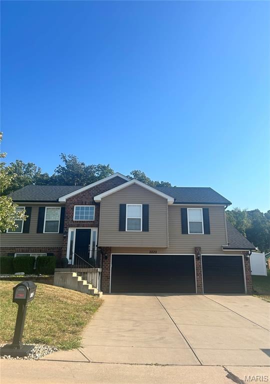 Wow! You'll want to see this beauty; the current owners have made extensive upgrades to this home! Take a look at this stunning split-level home featuring an OVERSIZED three-car garage (27 feet deep), perfect for truck enthusiasts or anyone who needs workshop space. Located on a cul-de-sac, this property is a must-see! 

This young home boasts main-floor laundry and an open floor plan ideal for entertaining or relaxing. It sits on a large, private backyard with a new vinyl fence installed by the seller in 2023. There's also an above-ground pool (installed in 2023) and a pergola (added in 2024) that will remain with the property. This outdoor area is perfect for gathering with friends and family. 
Additionally, a versatile storage shed houses the pool equipment and can double as a serving area for food and drinks—how cool is that? 
The current owners have made extensive upgrades throughout the home, which has a split-bedroom floor plan. The primary bedroom includes a newer vanity, extra cabinetry that will stay, and a walk-in closet. 
They also updated the home with all-new flooring in the main-level living areas and stairs, new kitchen lighting, and brand-new appliances, including a dishwasher, microwave, and refrigerator (all from 2023). The main-floor flooring and steps were updated in 2023; the garage doors are newer (2025), and a new front door was installed in 2024. The list of improvements goes on!