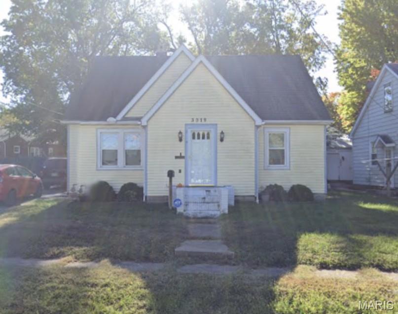 GREAT OPPORTUNITY FOR INVESTORS OR HOME BUYERS LOOKING FOR A VALUE-ADD PROPERTY!! A charming cottage-style home in a solid Alton location, offering more space than it appears from the street. Features include a one-car garage and a fully fenced yard with a privacy fence. The attic was refinished to create a functional primary suite with a true walk-in closet. Original hardwood floors run throughout and are ready to be brought back to life. This home offers amazing potential for a homebuyer or investor looking to add personal touches and cosmetic updates. Seller is motivated. Property is being sold as-is. Schedule a showing and explore the possibilities this home has to offer!