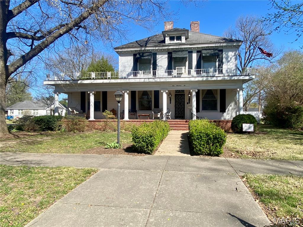 Step into timeless elegance with this stunning traditional home, built in 1905 and rich with historic charm, on the Dogwood Azalea Trail. The front porch with stately columns creates a welcoming first impression and leads into a grand foyer with a beautiful staircase and exquisite stained glass windows, setting the tone for the character found throughout. The main level features a formal living room perfect for entertaining, as well as a cozy den complete with built-in display cabinets and a wet bar. The kitchen offers plenty of storage, includes appliances, and provides a comfortable eat-in breakfast area. Just off the kitchen, you’ll find a charming keeping room, ideal for relaxing or gathering with family. A formal dining room with a classic bay window adds sophistication, while a full bathroom on the main level adds convenience. Upstairs, three spacious bedrooms provide ample comfort, along with an updated bathroom. Throughout the home, you’ll appreciate the intricate details including ceiling medallions, chandeliers, hardwood flooring, and other classic architectural features that highlight its historic beauty. With multiple flex spaces (primary suite, den, formal dining), this home offers excellent potential for additional bedrooms, offices, or hobby rooms to suit your needs. The fully fenced backyard includes a storage shed and plenty of space for outdoor enjoyment. A brand new roof adds peace of mind and long-term value. This beautiful historic home offers a rare opportunity to own a piece of timeless charm with modern versatility.
