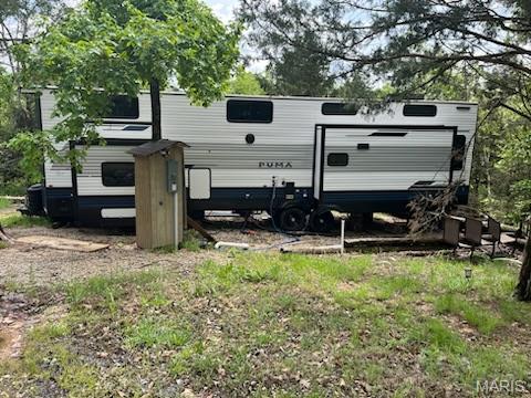 This a very private almost 8 acres.Secluded 7.57 acres with well , septic and Electric. Access to several lakes, Ride your ATV on miles of trails and roads. Close to the Black River , Mark Twain National Forest and State Parks. Mobiles and Tiny Homes are OK. Great place for weekends or year round home. There is a brand new destination trailer on the land that you could by both the land and the trailer for 120,000.00 See Pics