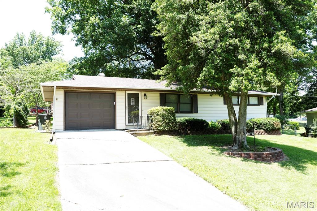 Welcome to this charming home located on a quiet side street in the heart of Cape Girardeau, just off Hopper Road. Conveniently situated within walking distance of Clippard Elementary School, this property offers a great combination of comfort, convenience, and additional living space.

The main level features two bedrooms and a full bathroom, along with a comfortable living room highlighted by an electric fireplace. The kitchen comes equipped with a gas stove and oven, microwave, and refrigerator, all of which will remain with the home. A piano is also included with the sale.

Downstairs, the partially finished basement provides excellent flexibility with a large bonus room, a full bathroom, and plenty of storage space to meet your needs.

Step outside to enjoy the spacious backyard, complete with a beautiful mature shade tree and a large screened-in back porch—perfect for relaxing, entertaining, or enjoying the outdoors without the bugs.

Whether you're a first-time homebuyer, looking to downsize, or searching for an investment opportunity, this well-maintained Cape Girardeau home is one you won't want to miss.