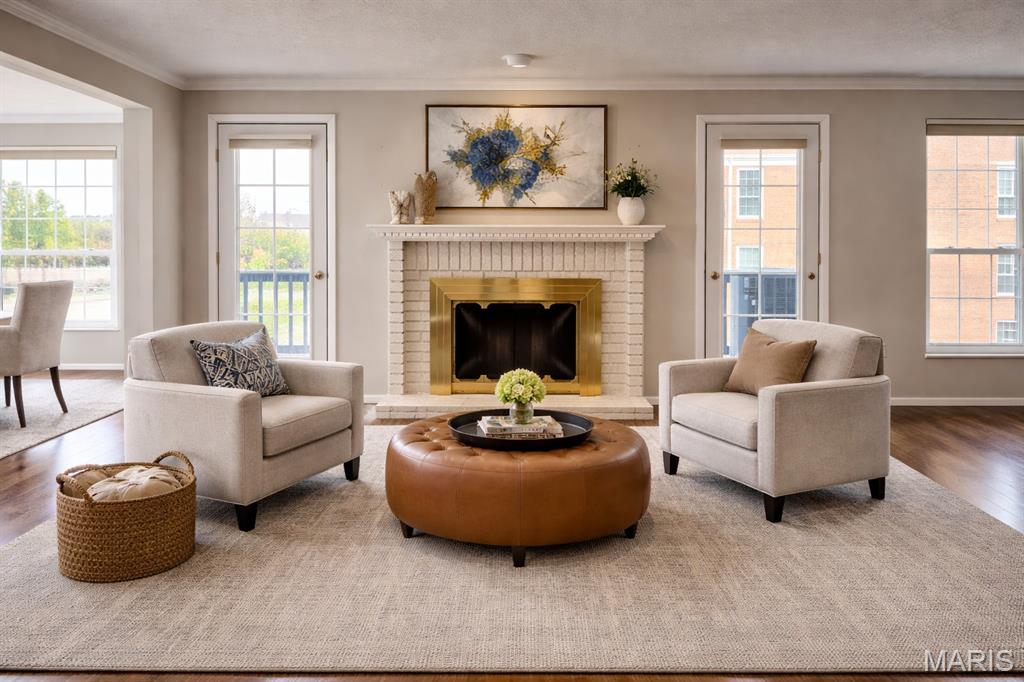 Looking for the BEST DEAL in the Manors of Oxford Hill? Well, this is it. At more than 1700 square feet of open living with 2 bedrooms and 2 full bathrooms, this is your opportunity to move in and make this space yours. All the carpets were replaced in March of 2025. When you first walk in, you’ll notice the HUGE open plan for dining and living spaces. Centering the space is the wood burning fireplace with mantel flanked by 2 separate doors leading to the wood deck, plenty of natural light pours through the windows. Parquet flooring in the entry and kitchen, ceramic tile flooring in the 2 bathrooms. In unit laundry is a bonus (not all units in this complex have it) and the washer and dryer stay as well as all the kitchen appliances including the refrigerator. The primary bedroom has a huge walk-in closet with plenty of room for everything! This unit has 2 dedicated parking spaces in the heated garage that convey with the sale. There is a swimming pool and cabana as an extra bonus. You really owe it to yourself to check this one out. Close to the JCC, shopping, dining, the airport and major routes like Lindbergh Blvd and the Page Extension for easy access to St Charles and beyond. Yes, this unit needs some updating, so come with ideas to make it your own. Property is being sold as is with the seller to do no municipal inspections. All appliances convey "as is" at no cost. Please use Special Sale Contract.