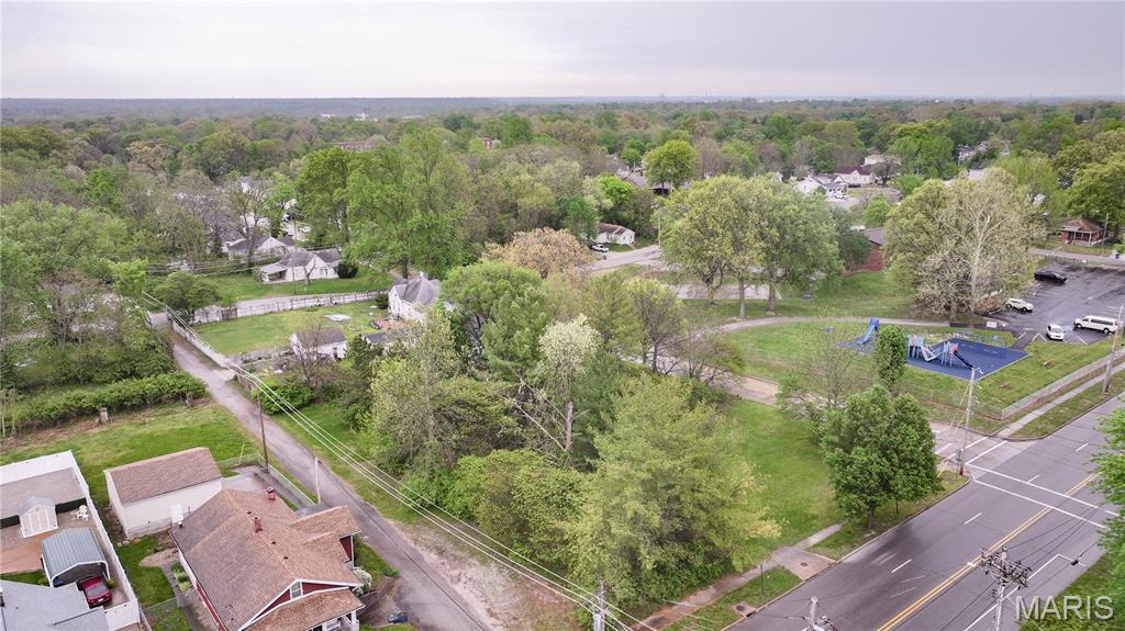 Commercial and R2 zoned property. Buyer to verify permitted uses.