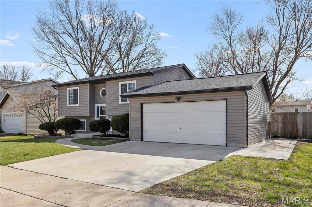 Welcome to desirable Riverwood Trails this updated and well-maintained split-level home offers strong curb appeal and a functional, easy-flow layout, complete with a newer roof, newer HVAC, new concrete driveway, and walkway leading to the backyard. The updated kitchen and baths provide a clean, move-in-ready feel.
The main floor bath stands out with a Jason MicroSilk tub, adding a spa-like touch to your daily routine.
The kitchen has been thoughtfully updated with ceramic flooring, custom cabinets with crown molding, granite countertops, and updated appliances. The lower level features luxury vinyl flooring, creating a comfortable additional living space, along with a cozy wood-burning fireplace.
Step outside to a nice deck overlooking a large, level, fully fenced yard, plus a 22x26 newer concrete patio—perfect for entertaining, relaxing, or letting pets run. A great combination of updates, comfort, and outdoor space in a convenient Florissant location.