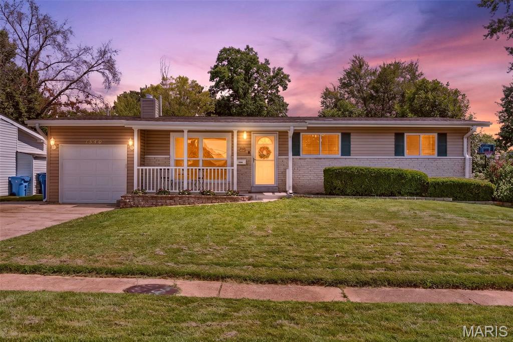 You will want to flock to Starling for this 4-bedroom ranch where there is plenty of space to spread out! Step inside to a spacious living room where large windows flood the space with natural light and a wood-burning fireplace adds warmth and character. From there, make your way into the inviting eat-in kitchen and dining room, giving you plenty of space to sit down for everyday meals while still keeping everyone connected. The gorgeous, thoughtfully designed kitchen features tall 42-inch cabinetry, a stylish tile backsplash, sleek stainless appliances, and plenty of counter space. A convenient side bar with additional storage cabinets AND a breakfast bar add even more counter space, making it perfect for hosting, casual meals, or displaying all those fun kitchen appliances you never know where to put! 

Just off the kitchen is the real standout, a massive 15x18 family room that's a unique find for the neighborhood and gives you some amazing additional square footage! A second fireplace makes the space feel extra cozy, while the sliding glass door takes you right outside to the fully fenced backyard and covered patio. Whether you're grilling, relaxing with friends, or letting the pets run around, this is a backyard you'll actually use and enjoy.
Back inside, three bedrooms and a full bath complete the main level, with upgraded windows and ceiling fans adding to the home's comfort. But there's still more! Head downstairs to the finished lower level where a dry bar opens to a large recreation space, giving you another great spot for game nights, movie nights, or entertaining. Continue through to find the legal 4th bedroom along with a huge 15x18 storage and workshop room which is something other homes in the area often do not feature. There's even a rough-in for an additional half bath that's already drywalled and painted with some of the accessories already included. This offers an opportunity to add convenience and instant equity down the road. Add in the 1-car garage, and all that's left is for you to move right in and make it yours.

The City of Florissant has already completed its occupancy inspection, and the seller is providing a 13-month Choice Home Warranty Ultimate Plan for added peace of mind. Sellers can close quickly. Some photos have been virtually staged to help showcase the possibilities of the space, but we think you’ll love the home just as much in person, schedule your appointment today! Don't let the opportunity to make this nest yours fly away.