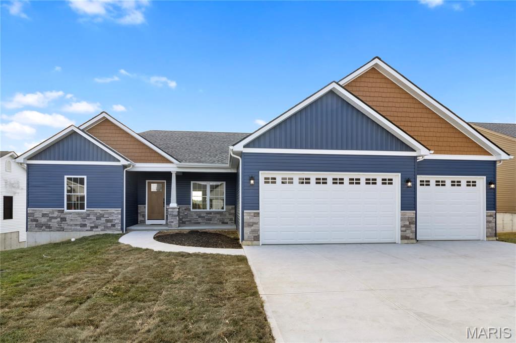 Welcome to your dream home—this stunning new construction ranch blends style, comfort, and function. The eye-catching exterior features a modern mix of vinyl and stone, paired with a spacious 3-car garage. When you step inside this gorgeous home you’ll notice the massive vaulted ceilings, unique arched doorways, cozy corner gas fireplace, and an open floor plan that’s perfect for entertaining.

The heart of the home boasts open kitchen with quartz countertops, shaker cabinets, large center island with extra seating, and a separate dining area, which is all complemented with luxury vinyl flooring throughout. You’ll certainly be the envy of your guests with extended seating on your covered deck, just outside the dining area! It’ll be your favorite hang out space. You have 3 bedrooms and 2 full baths on the main level, with plenty of room for your family, and extra room to grow in the spacious walkout basement! 

We can’t forget the gorgeous en-suite that boasts coffered ceilings, huge walk-in closet, double sink vanity that also has quartz countertops, tub, & separate shower/toilet room.

Main floor laundry room is right next to the en-suite for your convenience.

Don’t miss your chance to own this beautifully crafted ranch in Hillsboro—where modern design meets everyday comfort!