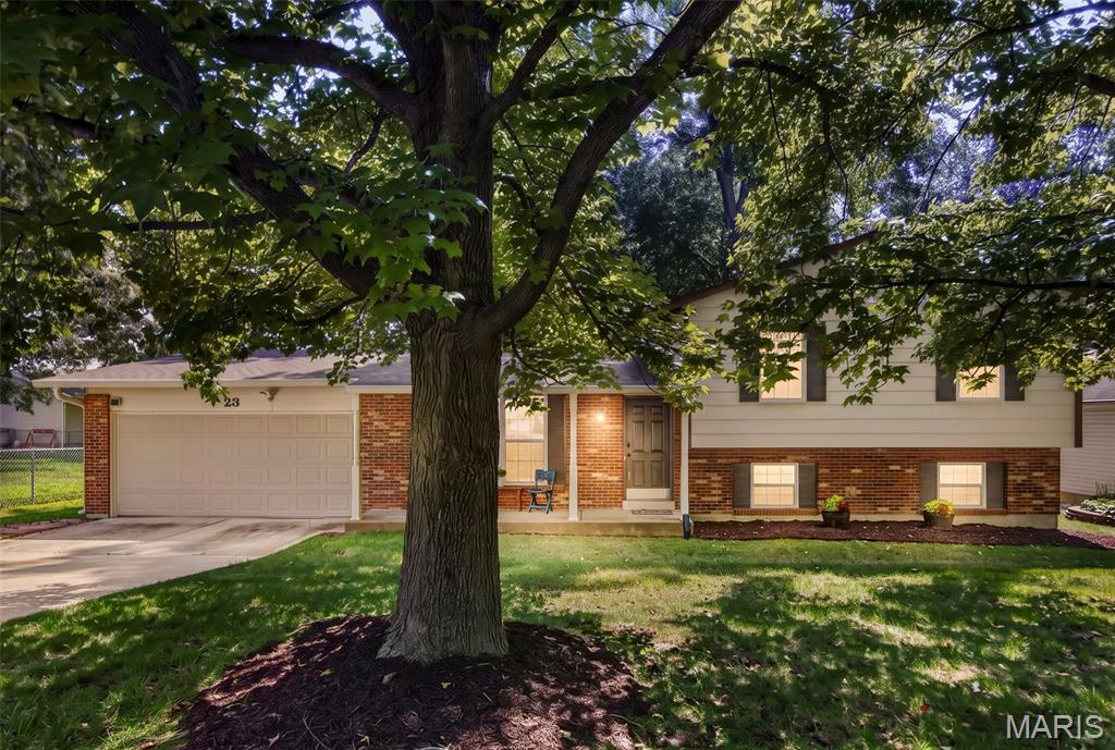 Spacious St. Peters home offering a flexible tri-level layout, multiple living areas, and a large backyard backing to trees and common ground! The main level features a bright living area and kitchen, with 3 bedrooms and 2 full baths upstairs. The finished lower level adds a family room, additional room with egress, and half bath—perfect for a home office, guest space, playroom, or additional living area. Recent improvements include a BRAND-NEW HVAC SYSTEM and NEW CARPET, giving buyers some valuable updates already completed. Enjoy the added privacy of the backyard while still being conveniently located near shopping, dining, schools, parks, and major highways. Plenty of space, a versatile floor plan, and a great St. Peters location—schedule your showing today!