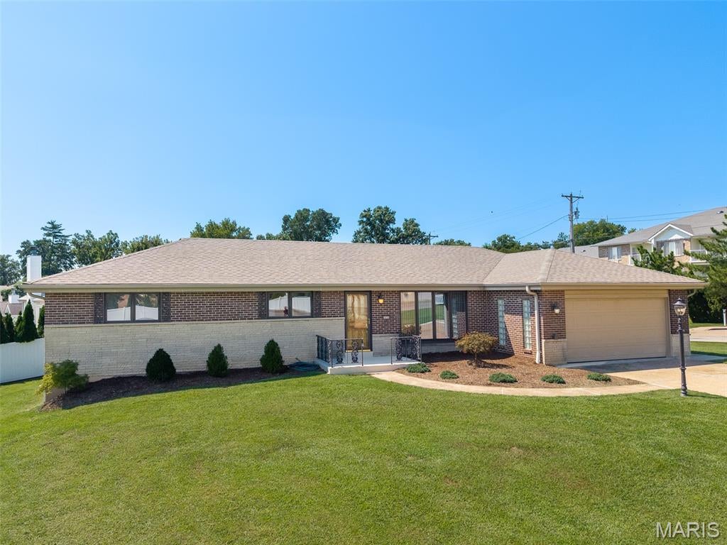 The home you have been waiting for is here! Clean and neat as can be!  Updated kitchen with custom cabinets, updated bathrooms, main floor laundry and an absolute must see garage.  Ranch style home with 3+ bedrooms and 3 Full baths!  4th potential bedroom in the basement subject to STL county occupancy approval.  The lower level could be a GREAT additional living quarters and it features a second FULL Kitchen, a Full bath, a Family room and the potential 4th bedroom with 2 nice size windows.    The yard is level, well landscaped, and is super easy to take care of.  FYI BONUS  Seller is willing to leave any and all furniture and appliances.  Choice home warranty also included.  This could be your move in ready home!  Put this home on your must see list!  Grand Opening Open house Saturday 9/12/26  2pm - 4pm  Come see!  Seller will also include a 1 year Choice Home Warranty peace of mind home warranty.