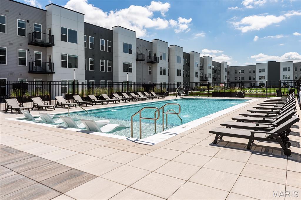 Discover elevated living on the top floor at Mila – Ellisville's newest luxury apartment community, built in 2025! This spacious 4th-floor 2BR/2BA Red Mulberry floor plan features two bedrooms, each with a walk-in closet, and one with an en-suite bath. The expansive 14' x 16'7" great room flows into an open kitchen with a large island, quartz counters & stainless appliances, ideal for entertaining. Enjoy wood-style flooring throughout, dual-vanity baths, and in-unit Washer /Dryer . Residents also enjoy resort-style amenities including a pool with sundeck & cabanas, courtyard with fire pit & grilling stations, and a pet park. Prime location near Clarkson & Manchester Rd with quick access to Hwy 64 & 44, minutes to shopping, dining, and top employers- all within the acclaimed Rockwood School District! LIMITED-TIME OFFER: 1 MONTH FREE on a 13-month or longer lease! Additional floor plans available, prices vary. Schedule your tour today! *Photos explicitly representative of floor plan/finishes, not actual unit.