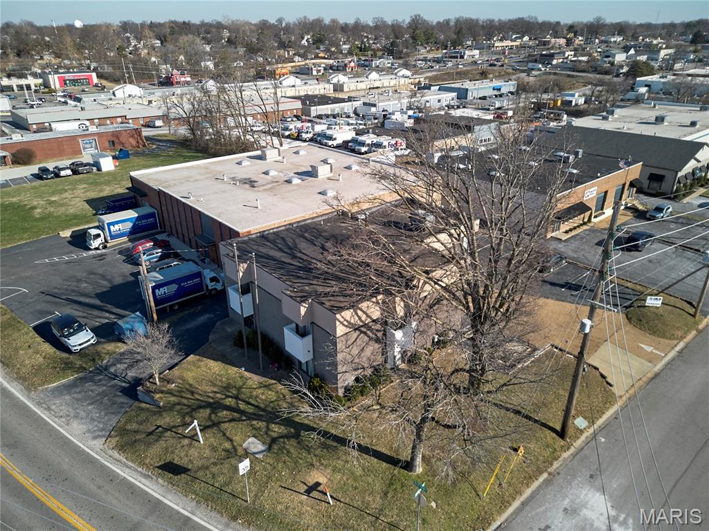Discover this impressive 6,700 SF two-story office/service building featuring modern systems, creative high-end finishes, and exceptional functionality. The property has been thoughtfully updated throughout — including zoned HVAC, upgraded electrical and plumbing, and high-speed data wiring — offering a turnkey solution for any business or investor.
A 1,000 SF sprinklered lower level provides excellent storage capacity, and a dock entry can easily be restored if needed. The site offers 12 parking spaces, easily accessible location just south of the signalized intersection at North Warson and MO-364, minutes from I-170 and only five miles from Lambert International Airport.The main level includes a welcoming reception area, multiple private offices, a conference room, a full kitchen with dishwasher, two restrooms, and a large open workroom. The second floor features additional spacious offices, an open bullpen, a second conference room, kitchen/breakroom with dishwasher, and two restrooms. Both floors have separate entrances and individually metered electric service, allowing for flexible multi-tenant or owner/user configurations.this property offers the perfect blend of functionality, style, and investment potential — ready for immediate occupancy.
