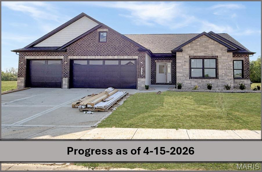 MERIDIAN OAKS (GLEN CARBON, IL) • EDWARDSVILLE SCHOOLS Don’t miss your opportunity to own a 4-bedroom, 3-full-bath home in the highly sought-after Meridian Oaks community, located within the award-winning Edwardsville School District. This beautifully finished home offers an open-concept layout with a large living room featuring a vaulted ceiling and a gas fireplace with stone surround—creating a warm, welcoming centerpiece for everyday living and entertaining. The upgraded kitchen includes granite countertops, an oversized center island, white cabinetry, and a generous pantry, offering exceptional storage and prep space. The primary suite provides a private retreat with dual vanities, a large tile shower, and a walk-in closet. A split-bedroom design adds privacy and convenience, paired with two additional main-floor bedrooms and a full bath. The WALKOUT lower level expands your living space with a spacious family room, dedicated game or bonus area, a fourth bedroom, and a full bath—ideal for guests, extended family, hobbies, or work-from-home flexibility. Outdoor living is enhanced by a covered patio off of the main level AND a patio off the walkout basement door, both overlooking a large backyard, perfect for grilling, gatherings, and play. Additional highlights include main-floor laundry and a 3-car garage for vehicles, storage, or workspace. Meridian Oaks offers a prime location close to bike trails, dining, shopping, and vibrant local nightlife, along with easy access to major commuting routes. This home delivers the right combination of space, convenience, and community lifestyle. Schedule your private tour with your favorite agent today and experience everything this home has to offer. FINISHED PHOTOS ARE OF A COMPLETED MODEL AND THOSE FEATURING FURNITURE ARE VIRTUALLY STAGED AND FOR DEMONSTATIVE PURPOSES ONLY. THE FLOORPLAN INCLUDED IN THE PHOTO LINEUP IS REVERSED FROM THIS MODEL....
