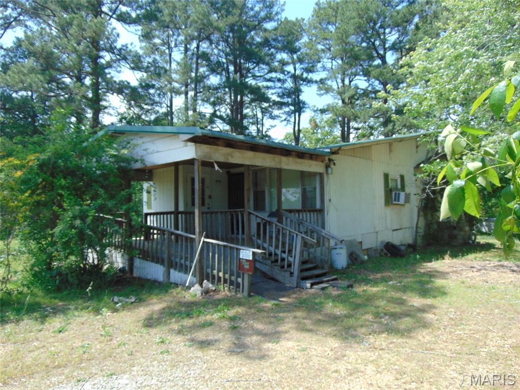 3 bed, 2 bath home built in 1962, perfectly located between Doniphan and Poplar Bluff on Highway 160 west of Fairdealing. Home could be lived in as it is, but in need of updates. Priced accordingly. Sitting on 4.17 acres m/l, this property could be divided and another home built on the west half of the tract. Owner is a licensed real estate agent.