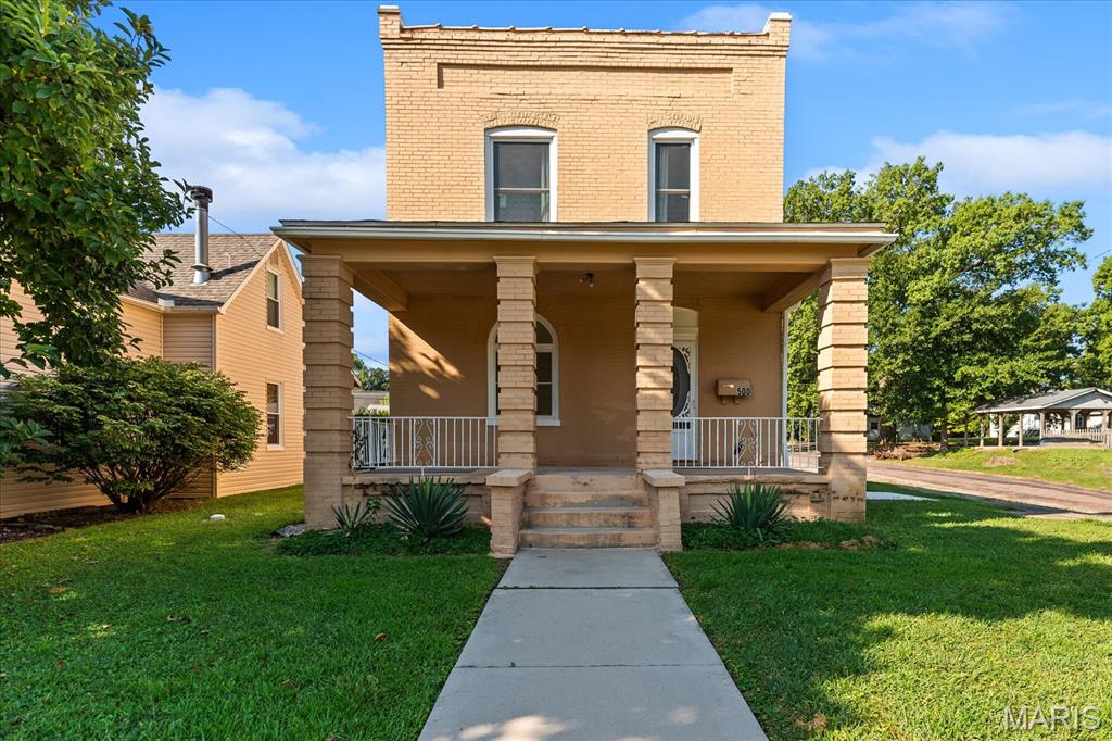 Wonderful historical home in one of Belleville's most desirable areas for under $140,000!  You can't beat the price or the beauty of the original antique open staircase.  The rooms are all spacious and the kitchen has a great commercial feel with a commercial grade stainless steel sink and countertop.  This property has so much to offer: corner lot, fenced in back yard, two car garage, large deck, and a covered front porch.  You will have plenty of space to entertain or relax on the back deck and the front porch is perfect for that morning coffee or simply to relax.  You will be just minutes from the vibrant downtown Belleville entertainment district.  The full basement is perfect for storage.  This property has passed Belleville city occupancy inspections and is move in ready.  All information to be verified by buyer and buyer's agent.