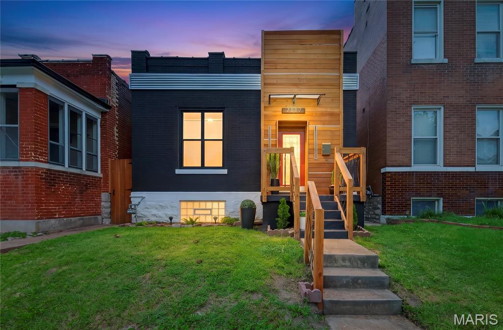 Located near Carondelet’s parks, trails, and neighborhood conveniences, this fully updated bungalow blends modern living with South City charm. Inside, you’ll find updated flooring, a bright kitchen with stainless steel appliances, and peace-of-mind improvements including a brand-new roof and newer HVAC system. The modernized exterior enhances curb appeal, while the finished walkout lower level provides a private bedroom and full bath — ideal for multigenerational living, a home office suite, or guest accommodations. A rare combination of location, style, and functionality.