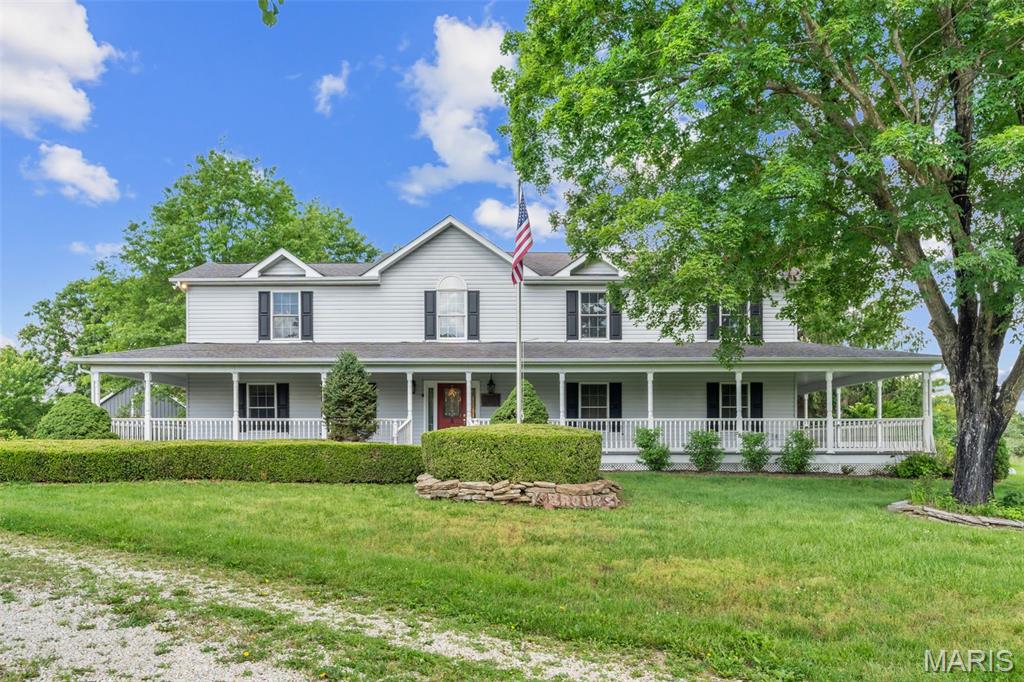 NEW PRICE-MOTIVATED SELLER! HORSE LOVER'S DREAM PROPERTY ON 24.7+/- ACRES! Experience the perfect blend of country charm and modern comfort in this beautiful home situated on 24.7+/- picturesque acres. A welcoming wrap around porch invites you into a warm and spacious interior featuring on the main level a country eat-in kitchen, a large living room with a shared gas fireplace connecting between living room and the primary bedroom suite. The luxurious primary suite offers enormous walk-in closet, dual sinks, jetted tub, separate shower and a private access to the wrap around porch. A second ensuite bedroom, a sunken dining room with access to the patio and pool. Convenient laundry area, and full bath. Upstairs, you'll find an additional primary bedroom suite with walk-in closet and two more generously sized bedrooms, and bonus area providing plenty of space for family or guests. Step outside to enjoy the inground pool and pool house while taking in the peaceful views of the surrounding countryside. Equestrians will appreciate the impressive barn complete with six stalls, tack room, equipment outbuilding, utility shed and workshop outbuilding. This property also includes a fenced play yard for children or pets, gated entry, and extensive open pasture with some vinyl/other perimeter fencing, offer ample room for horses to roam and ride. Opportunity awaits! The property needs some TLC but offers endless potential bring your vision, make it your own, this home can shine once again. This property is being Sold in Current Conditions "Sold As Is" Seller will do no repairs. Call today to schedule your appointment! This is a Duplicated listing-Original listing # 26033203.