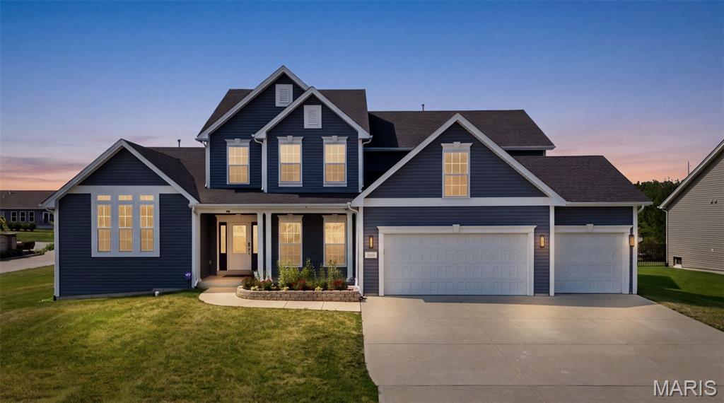 Step into refined comfort in this stunning 2020-built 1.5-story dream home, tucked inside the highly sought-after Lake St. Louis - Wyndemere Estates community. From the moment you enter, this property makes its intentions clear: built for both entertaining and everyday ease. The great room sets a welcoming tone with an open, airy feel, vaulted ceilings, walls of windows, and a decorative fireplace, while the nearby formal dining room offers the perfect backdrop for holiday gatherings and dinner parties alike. 

At the heart of it all is a chef's kitchen which was thoughtfully extended to maximize both function and space. Upgraded granite countertops, 42-inch custom cabinetry, and a spacious center island make meal prep and casual gatherings equally enjoyable. A 48-inch commercial grade cooktop with 6 gas burners + griddle, warming drawer, wall oven, and island microwave drawer handle serious cooking with ease. With space for two full-size refrigerators, as well as two included beverage coolers, this kitchen is ready for anything, from weeknight dinners to full-scale entertaining. The kitchen opens to additional dining space, and adjacent you'll find a hearth room, with its own gas fireplace, creating a cozy spot for quiet evenings at home. The walk-in pantry keeps everything organized and within reach, and main floor laundry adds another layer of everyday convenience.

Throughout, integrated Smart Home features, including lighting, fans, and window blinds, put full control at your fingertips, while wired 5.1.4 surround speakers turn movie nights into a true immersive experience.

The primary suite is a true retreat, tucked away on the main level and featuring a spa-like bathroom designed for unwinding at the end of the day. A custom-built closet system brings order and elegance to daily routines. Also on the main level, a private office with soaring vaulted ceilings creates an inspiring space to work from home, read, or simply escape for a quiet moment. 

Upstairs, a spacious loft offers flexible living space for a second family room, playroom, or guest lounge, along with three additional bedroom suites, each benefiting from thoughtful closet storage throughout.
Downstairs, the unfinished lower level presents a blank canvas of over 2,000 square feet, ready to become a home theater, gym, additional living quarters, or whatever fits your vision. 

Luxury vinyl plank flooring runs through the main level, offering both style and durability, while plush carpet adds comfort to the bedrooms. A Trane dual-zone HVAC system with gas furnaces keeps you comfortable through every Missouri season.

Set on a generous third-acre lot, this home offers the space, technology, and privacy today's buyers are searching for, all within easy reach of Lake St. Louis amenities, top-rated Wentzville schools, and convenient access to shopping, dining, golf and recreational sports. This is a rare opportunity to own a meticulously maintained, thoughtfully upgraded haven in one of the area's most desirable communities.