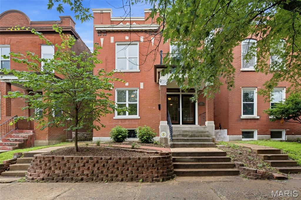 Looking for the perfect blend of historic charm and modern updates? This beautifully maintained Tower Grove East home delivers over 2,809 square feet of character-filled living space just moments from Tower Grove Park, South Grand, and some of St. Louis’ best restaurants, coffee shops, and neighborhood favorites. Inside, you’ll love the rich woodwork, pocket doors, stained glass windows, soaring ceilings, and custom built-in bookcases that give this home its timeless appeal. The spacious living and dining rooms flow effortlessly into the open kitchen and family room, creating an ideal space for everyday living and entertaining. The updated kitchen features black quartz countertops and brand-new Frigidaire Professional Series stainless steel appliances (2025). Upstairs, the oversized primary suite feels like a private retreat with a spa-inspired bathroom and its own deck—perfect for enjoying your morning coffee. Three additional bedrooms, second-floor laundry, and a charming upper balcony complete the second level. Outside, relax on the two-story deck overlooking the fenced backyard with brick patio, while the detached two-car garage provides the convenience that’s hard to find in the city. Major updates include a TPO roof (2017), upgraded central air conditioning (2019), and newer thermal tilt-in windows. The dry basement with tall ceilings offers exceptional storage and exciting potential for future finished living space. This is the kind of historic home buyers wait for—filled with original character, modern updates, generous room sizes, and an unbeatable Tower Grove East location.