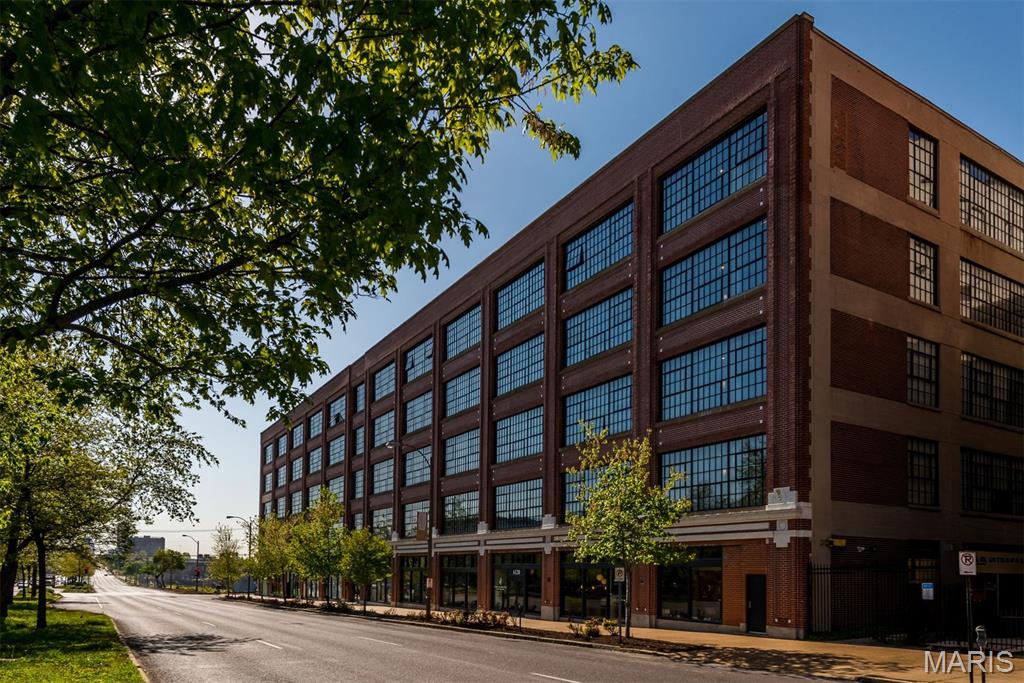 Welcome to West End Lofts, where historic character meets sophisticated urban living in the heart of the Central West End. Tucked into a desirable corner location, this one-bedroom loft offers abundant natural light throughout, including the bedroom. Warm wood floors, Italian cabinetry, natural stone countertops, and stainless steel appliances create a stylish, move-in-ready interior, while charming architectural details add distinctive loft character. The open, comfortable layout is complemented by the convenience of a laundry closet (washer/dryer included), covered parking space, and dedicated storage. West End Lofts is an amenity-rich community featuring a high-end fitness center, outdoor pool, billiards room, guest suite, updated lobby and secure/gated parking. Perfectly positioned just one block from the Cortex Innovation District and minutes from BJC, Washington University Medical School, SLU, Forest Park, and the dining, cafes, and entertainment of the vibrant Central West End. Condo fee includes water, sewer, gas, trash, basic cable, internet. Welcome home!