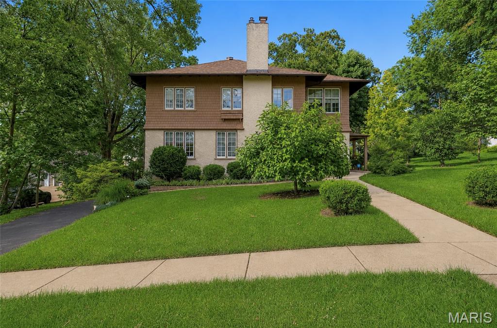 Showings begin Tuesday, June 23rd at 12pm. Open house Tuesday from 4:30-6:30 pm. For the first time in generations, this extraordinary Webster Groves home is ready to welcome its next chapter.
Built in 1917 and lovingly held within the same family ever since, 445 Algonquin Place is a rare offering where history, craftsmanship, and thoughtful modernization come together seamlessly. The most recent steward of the home undertook the privilege of updating its systems while preserving the architectural details that make homes of this era so special.
Throughout the home, you'll find beautifully preserved woodwork, original built-ins, and intricate trim that speak to a level of craftsmanship seldom found today. Behind the scenes, major improvements to the electrical, plumbing, kitchen, and bathrooms provide the comfort and convenience expected for modern living.

With 4 bedrooms and 3.5 bathrooms, the floor plan offers flexibility for a variety of lifestyles. A main-level bedroom with an ensuite bath creates an ideal guest suite, private office, or multigenerational living arrangement. Upstairs, the primary suite is joined by two additional bedrooms and another full bath.

The nearly finished third-floor attic offers endless possibilities; whether envisioned as a playroom, home office, fitness space, studio, or retreat. Below, a rare tandem two-car garage provides convenient parking and storage within the basement level.
Meticulously maintained and deeply loved, this home sits on a picturesque street in one of Webster Groves' most cherished neighborhoods, where mature trees, timeless architecture, and a strong sense of community create an unmatched setting.
This is more than a home. It's a legacy property, carefully preserved for over a century and ready for the next family to create memories for generations to come.