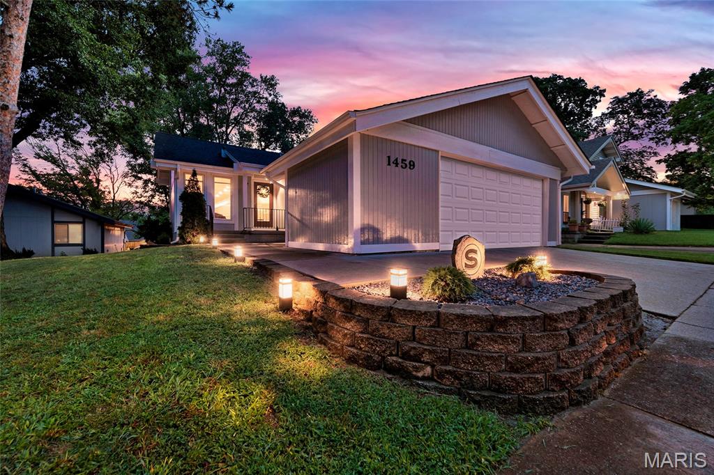 Welcome home to this beautifully maintained 3-bedroom, 2-bath home tucked away on a quiet cul-de-sac in Mystery Hills! Freshly updated flooring and neutral paint create a warm, inviting feel throughout the main living areas. The spacious living room features a vaulted ceiling and plenty of natural light, while the bright kitchen offers ample cabinetry, a skylight and adjoining dining area. The finished lower level provides approximately 418 additional square feet of versatile living space, including two finished rooms, a full bath and laundry area—perfect for a home office, gym, recreation room, bedrooms or additional living space. The oversized 2-car garage offers excellent storage and workspace. Enjoy the private, level yard and attractive landscaping from this desirable location. With 930 square feet above grade plus 418 square feet of finished lower-level space, this home offers approximately 1,348 square feet of total finished living area. Refrigerator, Washer and dryer are staying. The seller is still burying the drainage pipe that was damaged by the fence company. It will be completed by closing.