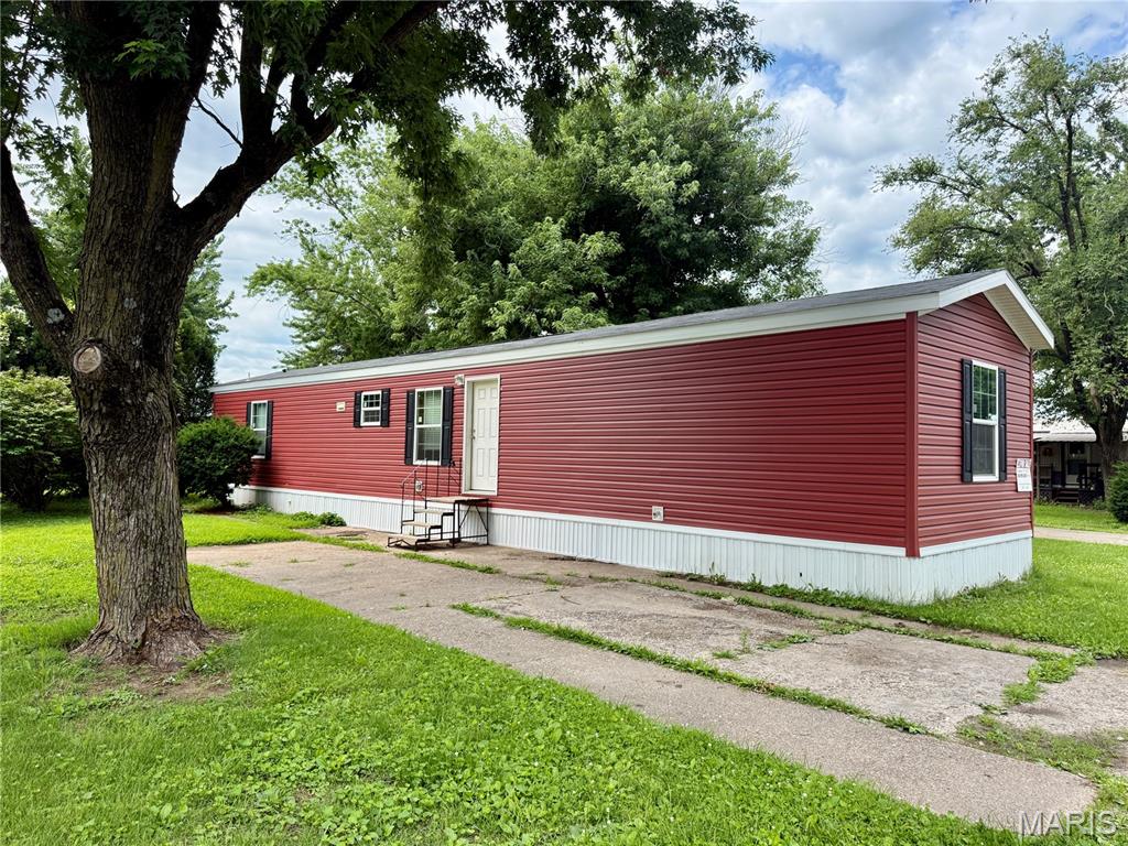 Affordable living or a great investment opportunity in Ramsey Jones Park! This well-maintained 3-bedroom, 2-bathroom mobile home offers a spacious, open-concept kitchen and living area with a desirable split-bedroom floor plan for added privacy. The primary suite features a relaxing soaking tub and private bathroom, while a second full bath conveniently serves guests and the additional bedrooms. Located just 1 mile from Wyaconda State Park, this property is perfect for outdoor enthusiasts or could make an excellent Airbnb or short-term rental investment (subject to applicable rules and regulations). This property is a foreclosure sale. Lot rent is only $165 per month with a month-to-month lease, which includes sewer and garbage. Schedule your showing today!