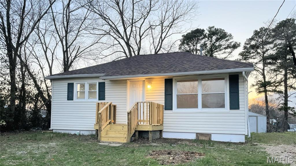 This cute home has been made new in almost every way! Brand new updates include flooring, trim, doors, light fixtures, paint, refinished walls, toilet, vanity, front deck and more. Other recent updates include roof, water heater, shower/tub, cabinets, countertops, wiring, etc. This home should offer a very clean and refreshed start for anyone looking for an affordable and low maintenance home. Back yard is good size and comes with a little storage shed. Home has laundry hook ups ready to go. Brand new stainless steel kitchen suite appliances! This will make a great first home or a downsizer.