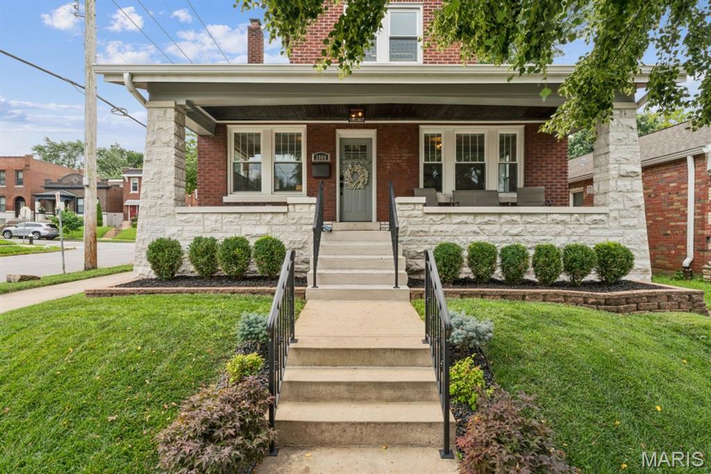 Beautifully renovated in 2014, this 1927 bungalow pairs classic Tower Grove South character with thoughtful modern updates. A wide, welcoming front porch sets the tone. Inside, gleaming dark hardwood floors, top-down/bottom-up shades, designer lighting, crisp white trim, crown molding, and abundant natural light enhance the open layout, which includes both living and family rooms.

French doors open to a main-level bedroom currently used as an office. Designed for entertaining, the oversized kitchen features a six-foot center island, quartz countertops, a distinctive backsplash, 42-inch cabinetry, and an easy connection to the dining room. A roomy full bath and an exceptionally large laundry room complete the first floor.

Upstairs, the primary suite impresses with a tray ceiling, expansive walk-in closet, and private bath with a floating vanity and generous walk-in shower. Two additional bedrooms, each with its own walk-in closet, share a third stylish bathroom.

Outside, the landscaped backyard offers low-maintenance turf, mature plantings, and a two-car brick garage. Major improvements include a 2025 roof and a zoned Trane HVAC system installed in 2026. AT&T Fiber is already connected.

Move-in ready and ideally located near neighborhood parks and an excellent variety of dining destinations, this Tower Grove South home is not to be missed.