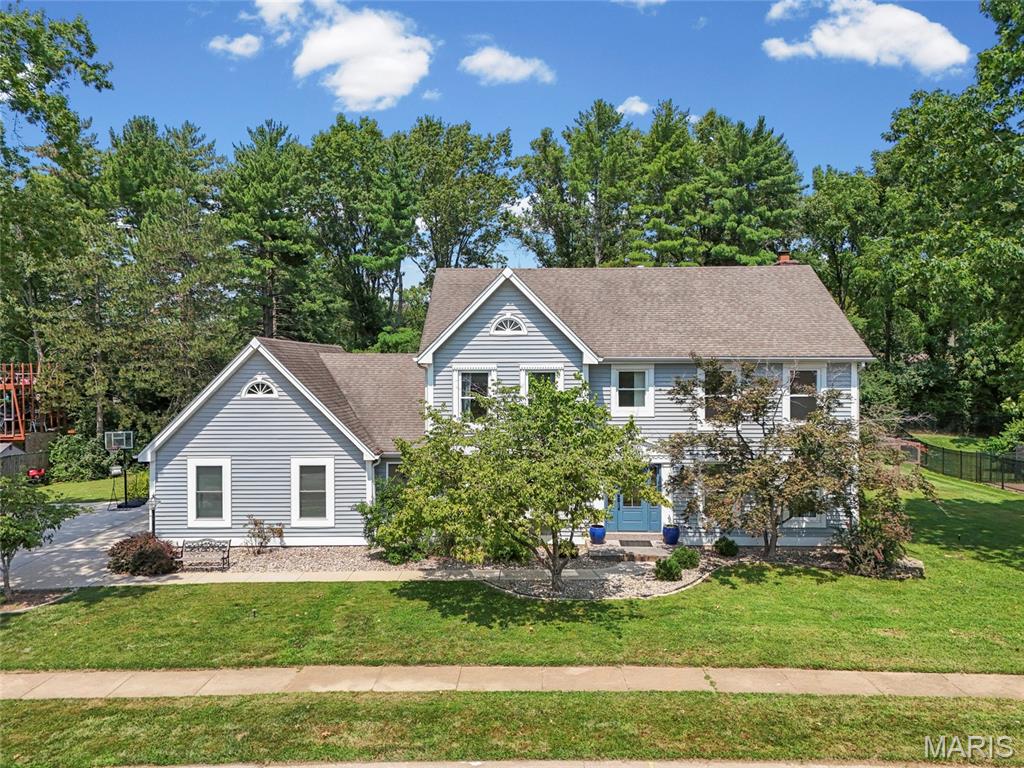 Must see this beautifully updated Chesterfield home in sought-after Green Trails West II! The bright, open-concept floor plan offers spacious living areas filled with natural light, highlighted by large bay windows and features white birch flooring throughout the home. The updated kitchen features beautiful quartz countertops and opens seamlessly to the living and entertaining spaces. Thoughtful upgrades continue throughout the home, including all-new windows, new exterior doors, and extensive new concrete around the home designed to improve drainage and direct water away from the foundation. The driveway all new concrete The garage offers additional storage space. A separate mudroom features custom built-in cabinetry for exceptional everyday organization. Every bedroom offers a walk-in closet, with an additional oversized walk-in closet conveniently located in the upstairs hallway. The spacious primary suite features a vaulted ceiling and modern skylight, creating an airy, light-filled retreat. The finished basement provides even more flexible space for entertaining, recreation, a home office, or additional living area. Ideally located in an established Chesterfield neighborhood with convenient access to Parkway schools, parks, shopping, dining, Olive Blvd, Hwy 141and I-64/40. Extensive updates, exceptional storage, abundant natural light and a fantastic location make this home a must-see!