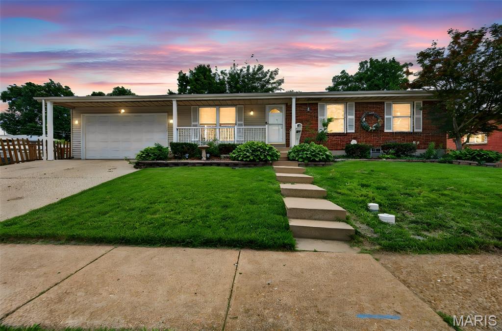 Welcome Home! Over 3200 sq ft on a double corner lot with easy access to highways and shopping! This ranch has been well maintained and updated! Great curb appeal and mature landscaping with plenty of street parking in addition to the 2 car attached garage and driveway. Inside you will find updated neutral paint throughout . No carpet in this home! Pergo wood plan carries through the living room and main floor bedrooms. Tiled kitchen and more plank laminate flooring in the lower level. Updated- lighting and fans throughout- a 2 year old roof and HVAC is just 6 six years old. Finished LL with 2 possible sleeping rooms, a half bath, rec area, kitchenette area and plenty of storage. The main level offers 3 beds and 2 baths, a spacious dining area connected to the kitchen. Out back is a wood deck leading to the large yard and patio. This place is move in ready- unpack your boxes- you are HOME!