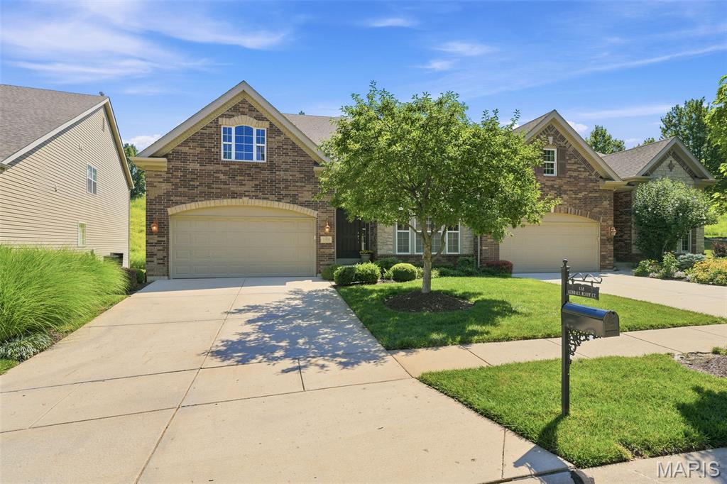 Welcome to the Villages of Kendall Bluff, a sought-after gated community offering low-maintenance living in the heart of Chesterfield! This beautifully designed 1.5-story villa features 3 bedrooms and 3.5 bathrooms with upgrades throughout. This inviting open layout balances daily functionality with stylish entertaining. Upon entry you'll notice the living room/office that opens to the formal dining room with butler’s pantry, leading to the gourmet kitchen with large center island/breakfast bar with granite counters, a double oven and custom cabinetry that all create a seamless flow into the impressive 2-story great room. Here, built-in bookcases, a soaring wall of windows, and access to your private deck create a warm, inviting space. The main-floor primary suite offers spacious closets and a large bathroom with separate vanities. A main-floor laundry, half bathroom and attached 2-car garage add everyday convenience. Upstairs, find two generously sized bedrooms - each with its own walk-in closet and full bath - plus a loft overlooking the great room, ideal for a home office, media room, or to simply lounge. The lower level is ready for your finishing touch. All this in a gated neighborhood just minutes from Chesterfield’s best shopping, dining, parks, and highways!