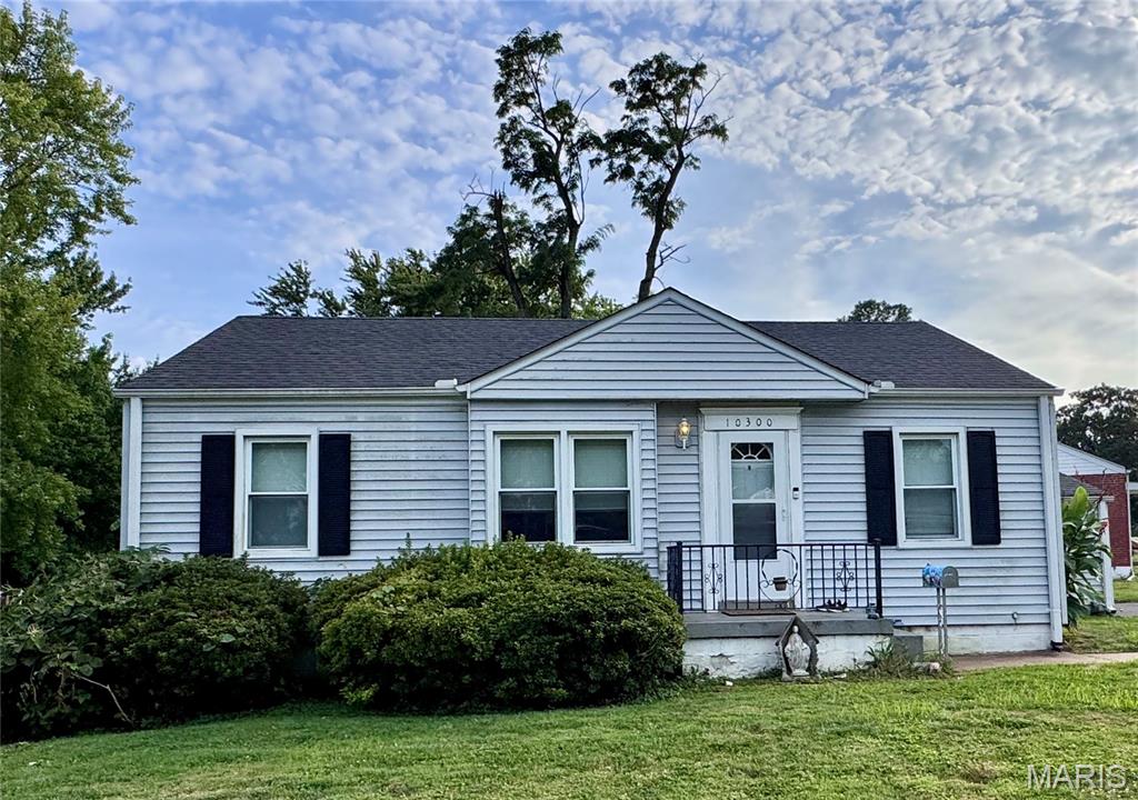 This St. Ann bungalow is on the market for the first time in years! Featuring two bedrooms, one full bathroom with hardwood floors, a spacious kitchen, a large corner lot with a fenced area, and a deck, this home has so much potential. Don't miss the oversized 1-car attached garage with an additional parking pad, perfect for gatherings. The full-size basement is unfinished, offering an opportunity to finish and add extra living space. This home is ready for updates and is a perfect addition to any investor portfolio for fix-and-flip, to fix and hold as a rental, or for the handy homeowner looking to build sweat equity. Home to be sold as-is with no inspections or repairs.