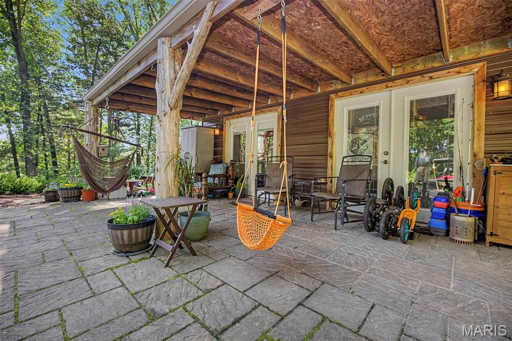 PRICE REDUCED. UNIQUE AND PRIVATE.  LOCATED ON 4.87 ACRES SURONDED BY NATURE AND BEAUTY. 3 BEDROOM, 1 FULL BATH ROOM. HEATED AND AIR CONDITIONED WITH A SPLIT UNIT. HOME IS 1248 SQUARE FEET. THIS RUSTIC HOME IS A ONE OF A KIND.. SPRINGS RUN THROUGH THE PROPERTY. THIS IS A MUST SEE. NOT A DRIVE BY. AN ADDITIONAL HOME WITH ACREAGE AVAILABLE.  REQUEST A PRIVATE SHOWING. LOCATED NEAR 
I-44 CORIDORI AND AMUSEMENT PARK, SHOPPING AND RESTAURANTS. HAVE THE PRIVACY OF THE COUNTRY AND THE AMENITIES OF THE CITY. INVESTORS WELCOME.