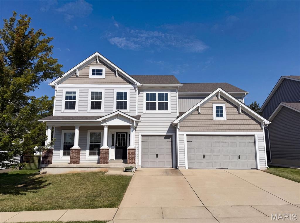 Built in 2015, 5945 Hawkins Ridge Ct is a two-story Saint Louis home. The kitchen combines quartz countertops, stainless steel appliances, and generous cabinetry with an open flow into the living and dining areas. A main-level study with french doors adds a flexible work space, and an upstairs loft offers additional room to gather. The primary bedroom includes a walk-in closet and an ensuite bathroom with a double-sink vanity, a soaking tub, and a separate shower. A covered patio overlooks the backyard, an unfinished basement provides expansion and storage potential, and a three-car garage completes this well-maintained residence with practical amenities throughout every room.. Included 100-Day Home Warranty with buyer activation