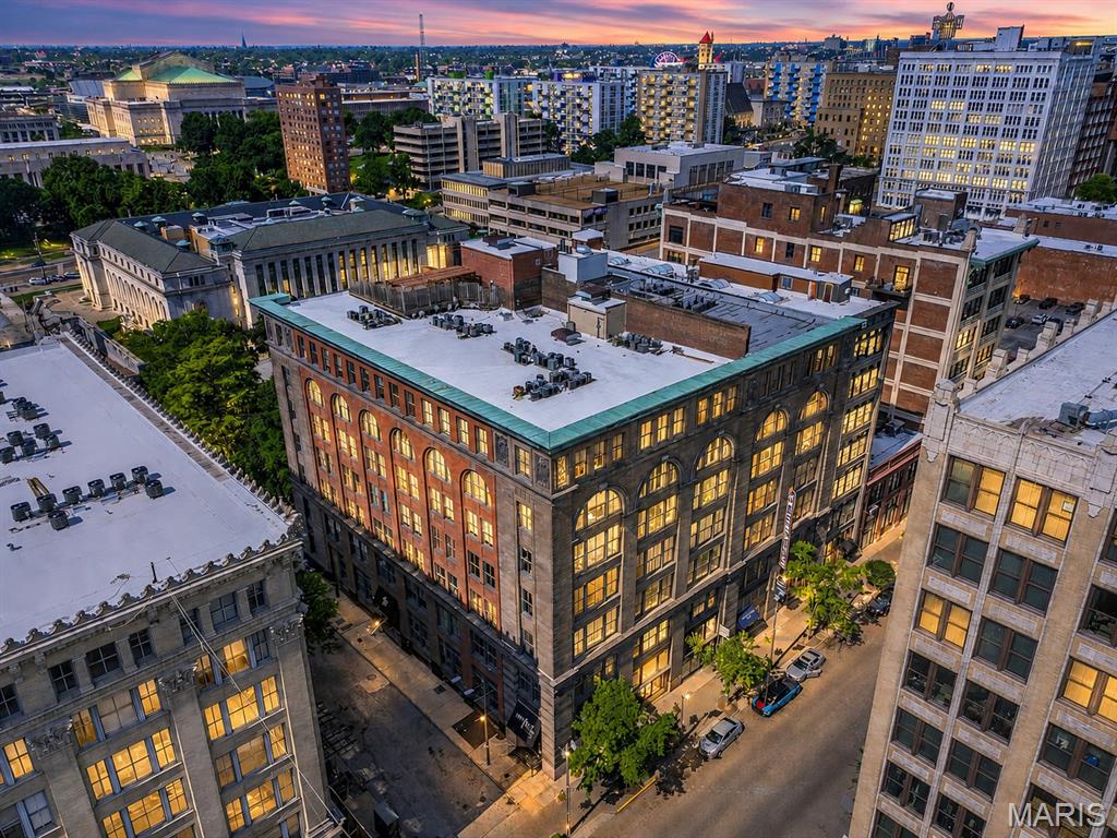 Welcome to The Knickerbocker Lofts, where the best of downtown St. Louis is right outside your door. Enjoy the convenience of having Rosalita's across the street, along with countless restaurants, entertainment venues, and attractions just steps away, including the St. Louis Public Library, Enterprise Center, and Stifel Theatre. Inside, this stunning loft showcases the character and charm that define urban living, featuring soaring wood-beam ceilings, exposed ductwork, rich wood flooring, and oversized windows framed by exposed brick that flood the space with natural light. The open-concept layout creates an inviting and spacious feel, while thoughtful features such as abundant storage, an in-unit washer and dryer, and newer carpeting in the bedroom add everyday comfort and convenience. This residence truly offers the perfect blend of historic charm and modern amenities. Don't miss your opportunity to make it yours!